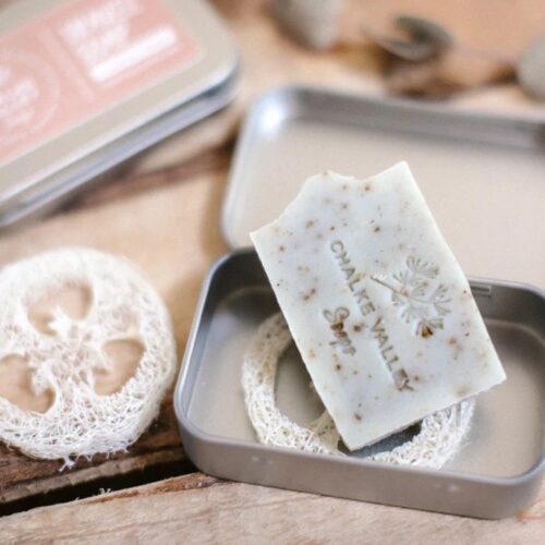 mini soap in travel tin with loofah rack